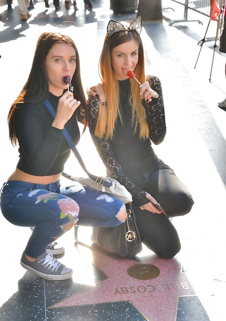 Rangy cuties Lana Rhoades and Stella Cox kissing and masturbating with toy near the pool