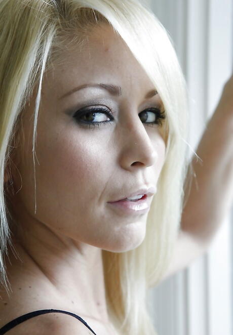 Very attractive american milf Monique Alexander in hot lingerie uncovering small tits and spreading her legs 